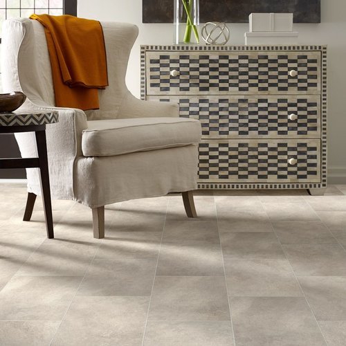 beige armchair on a beige tile flooring from Roedigers Custom Flooring in Celina, OH